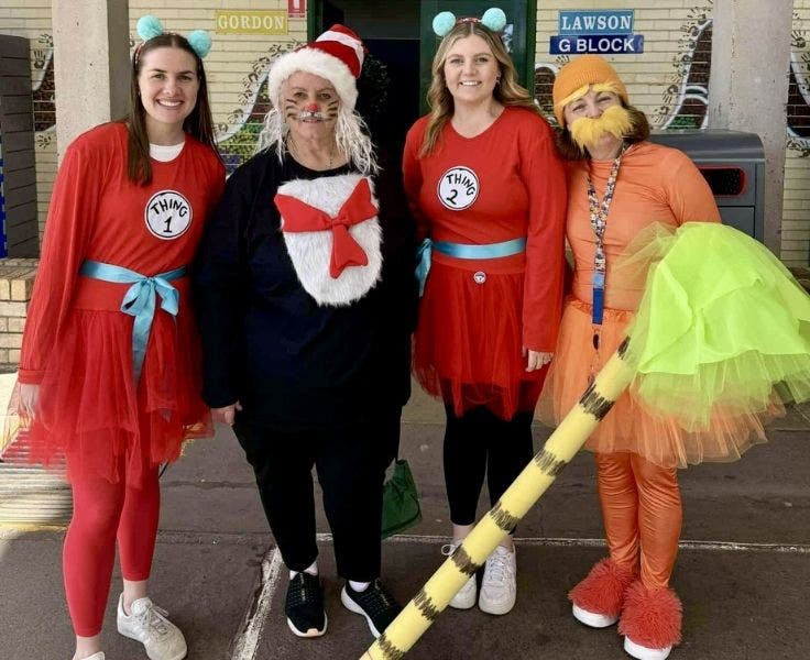 staff participating in book parade